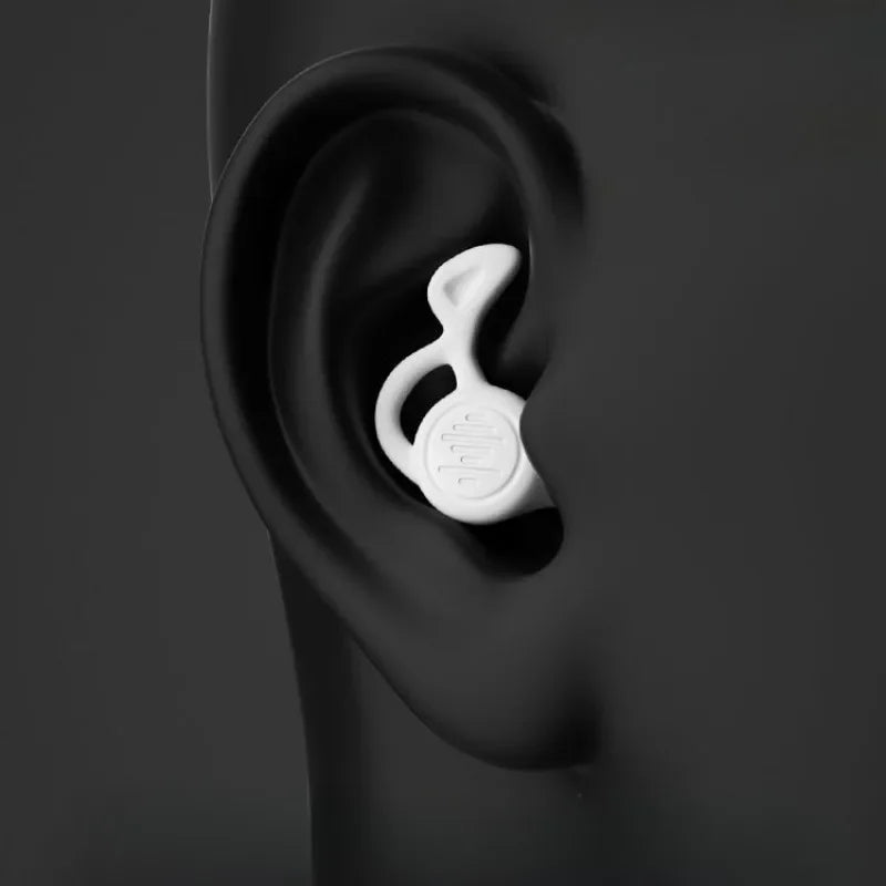 Bouchons d'oreille Decalo dans leurs trois coloris : bleu, noir et blanc